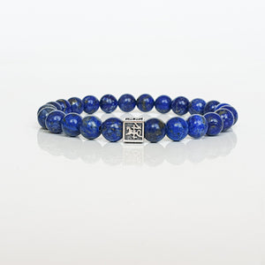 Lazurite bracelet for men with Vytis silver 925 charm, Blue beaded bracelet with a silver clasp on a white background