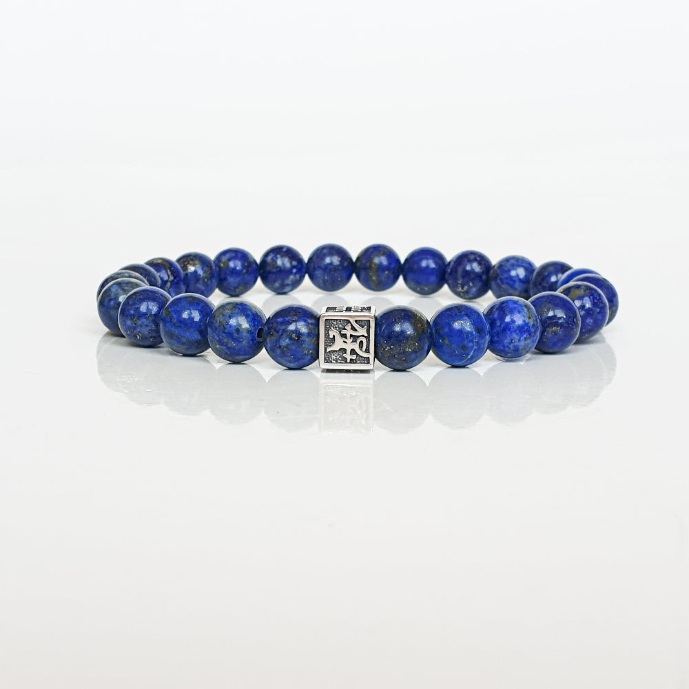 Lazurite bracelet for men with Vytis silver 925 charm, Blue beaded bracelet with a silver clasp on a white background